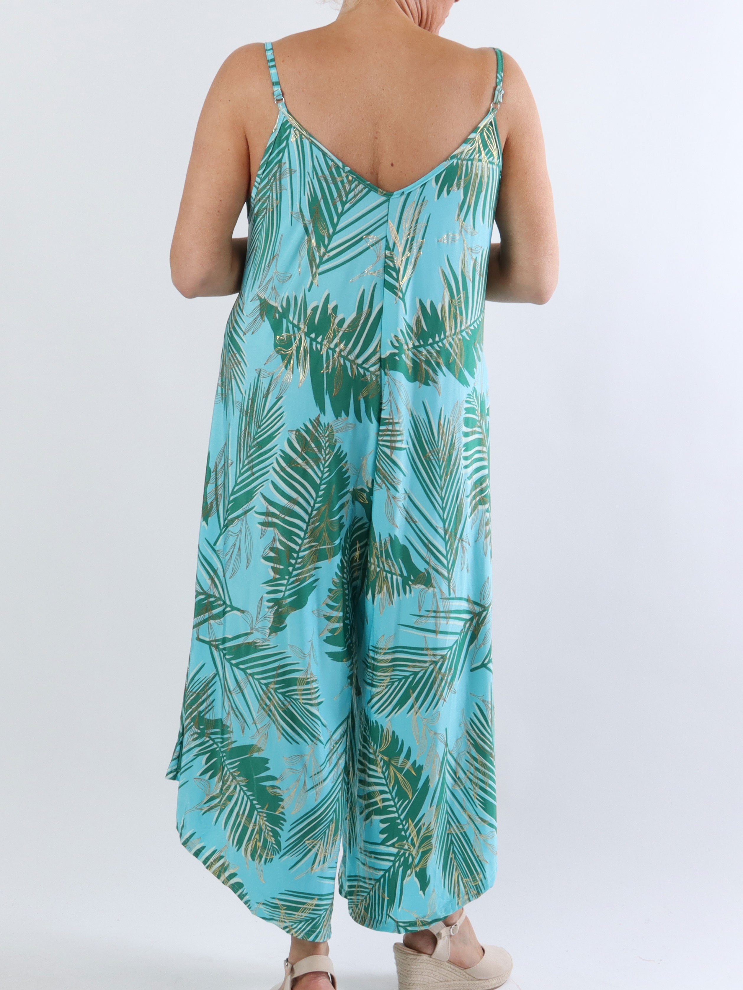 Felicia palm - Plus size buksedragt med vide ben i stretchty stof